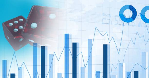 istock Digital illustration red dices over graphs and statistics in a blue background 1266965527