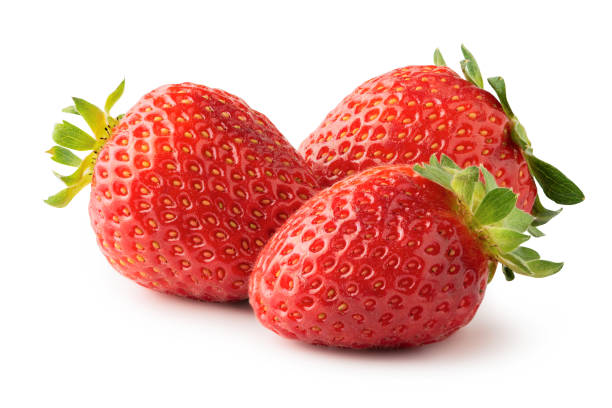 istock Three ripe strawberry fruits isolated on white background. Clipping path 1266966010