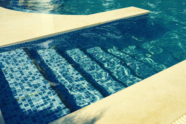 istock Tiled entry stairway to the swimming pool 1266966417