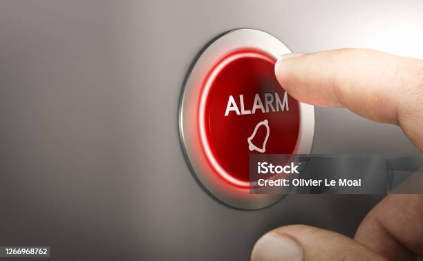 Man Pressing A Red Security Alarm Button Stock Photo - Download Image Now - Alarm, Push Button, Danger