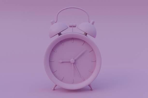 istock Monochromatic concept: Retro style alarm clock in pink 1266972872