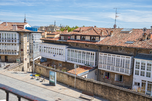 Vitoria-Gasteiz, Alava, Spain - July 16, 2020: Openwork balconies in the Old town of Vitoria Gasteiz