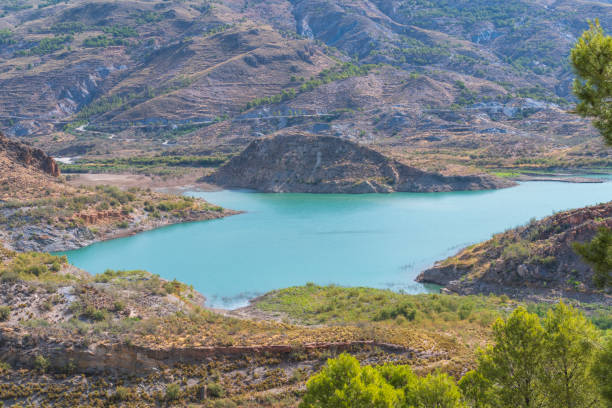istock Beninar reservoir surrounded by mountains 1266977596