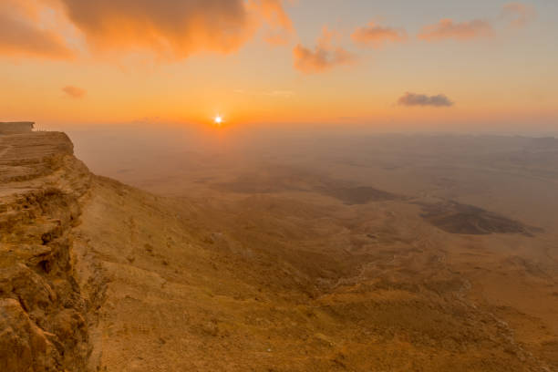 istock Sunrise view of cliffs and landscape in Makhtesh (crater) Ramon 1266977996