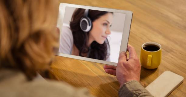 istock Woman having video call on digital tablet 1266980515