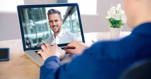 istock Man having video call on laptop. 1266983224