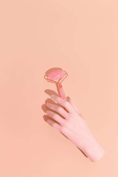 istock Face care concept art. Minimal still life design. 
Massage quartz roller 1266984538