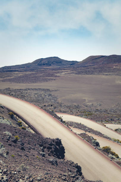 istock winding road, reunion island 1266984676