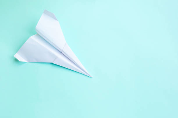istock Summer travel with paper plane. Summer concept. 1266986103
