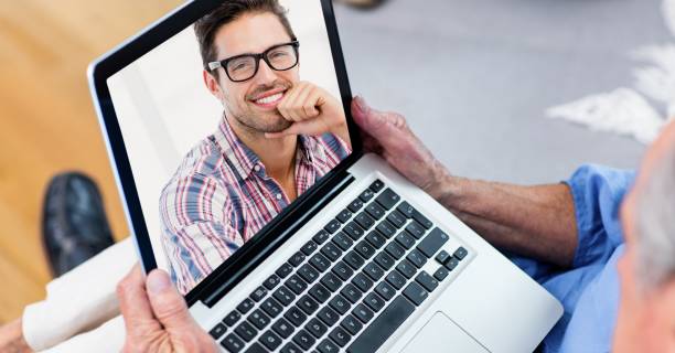 istock Senior man having video call on laptop. 1266986254