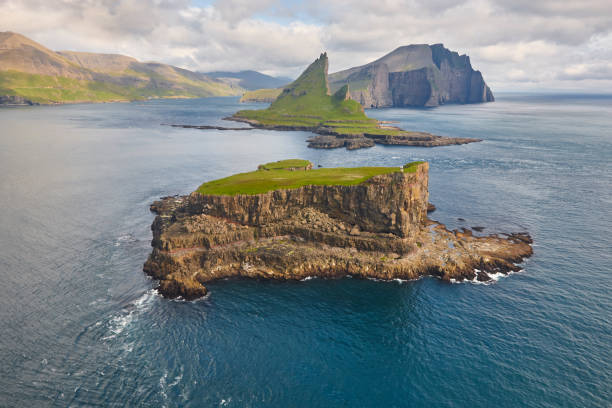 istock Faroe islands dramatic coastline viewed from helicopter. Vagar flight 1266989008