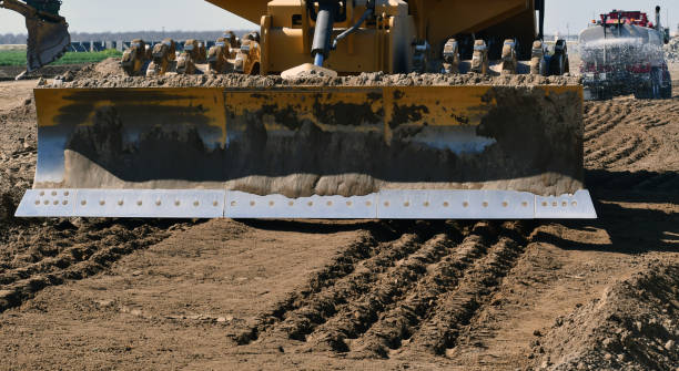 An excavator working in an industrial area