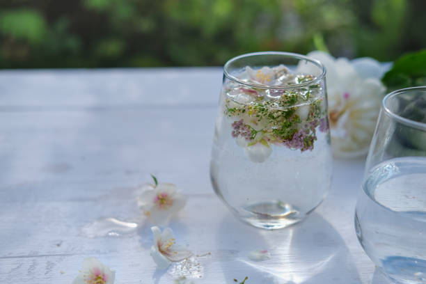 istock garden wedding drinks. transparent non alcoholic drink with flower decoration. outdoors wedding. 1266995842