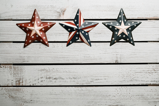 American stars and stripes flat lay over rustic wood background in Boise, ID, United States