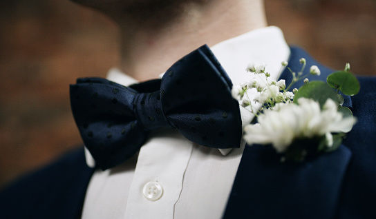 Cropped shot of an unrecognisable man dressed up for his wedding day