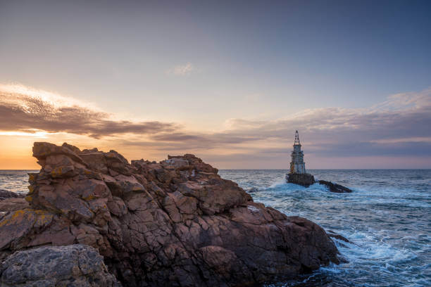 istock Sunrise at the lighthouse in Ahtopol, Bulgaria 1267000006