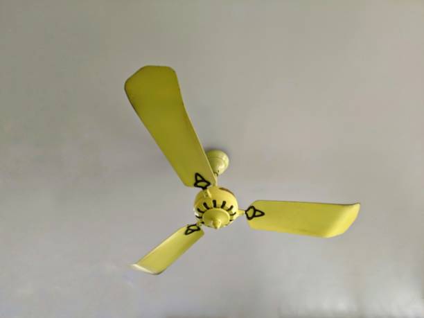 istock yellow ceiling fan in Vietnam 1267001130
