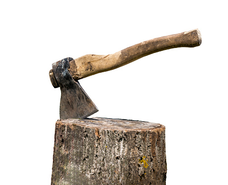 Axe on stump isolated on a white background