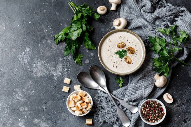 istock Mushroom cream soup on dark background. Mushroom soup 1267002651