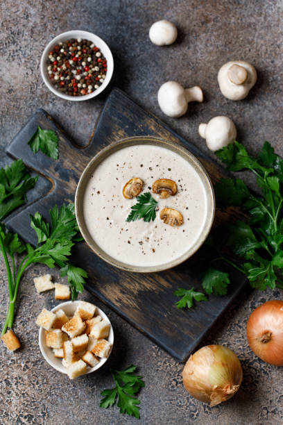 istock Mushroom cream soup on dark background. Mushroom soup 1267002741