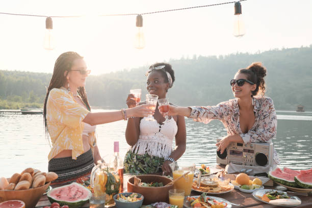 istock Woman toasting with wine 1267003929