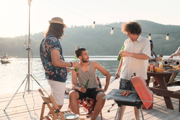 istock Guys drinking beer outdoors 1267003933
