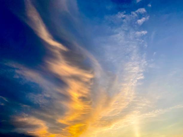 istock Blue sky with white clouds at sunset in summer time. 1267005926