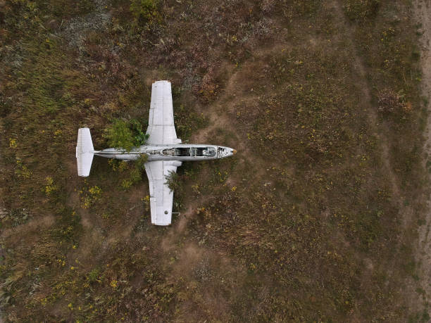 istock Old abandoned airfield with abandoned planes. Aerial view. 1267007001
