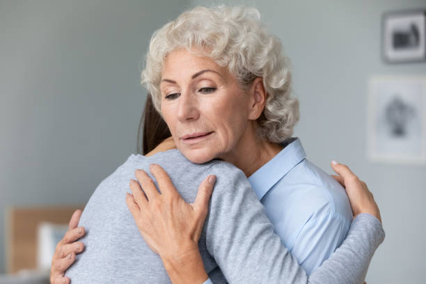 istock Thoughtful middle aged senior mother comforting stressed daughter. 1267013620