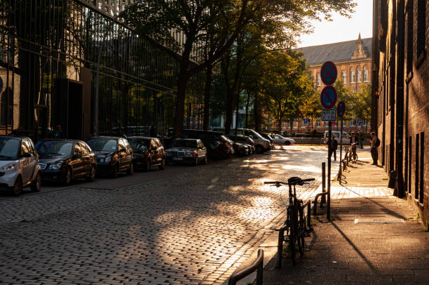 City street of Hamburg. Old road and corporate buildings stock photo
