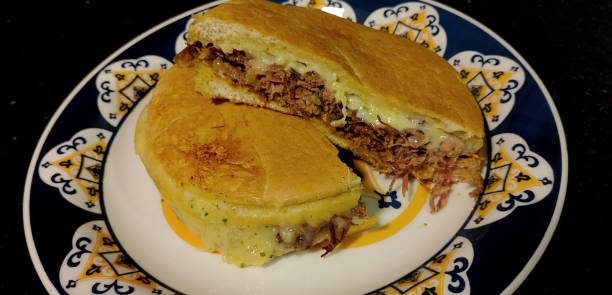istock Delicious pressed sandwich of shredded meat. 1267017246