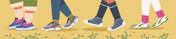 1910.m30.i010.n032.s.c12.1400211086 кроссовки и ножки. модные мужские и женские ноги в красочной обуви с носками и татуировками. векторный спорт отдыха обув - foot walk stock illustrations