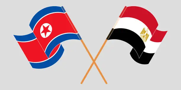 Vector illustration of Crossed and waving flags of Egypt and North Korea