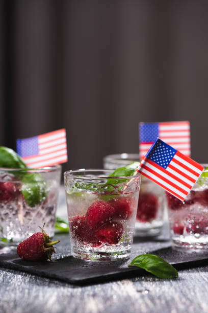 istock Alcohol shots of berries cocktail with a raspberry and basil 1267019587