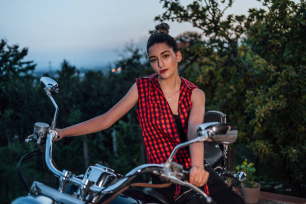istock Biker woman on motorcycle 1267019652