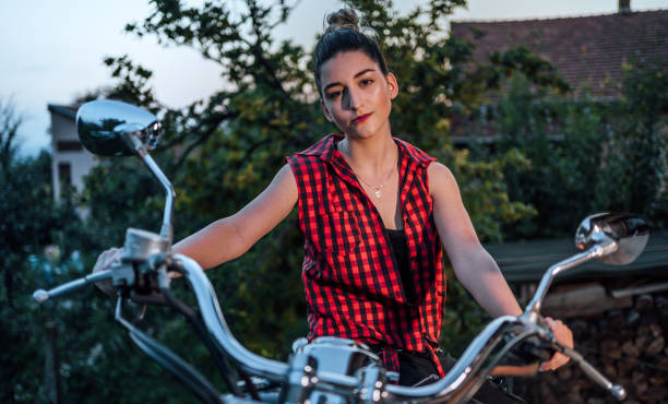 istock Biker woman on motorcycle 1267019873