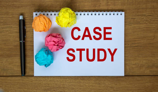 istock White note with inscription 'case study' on beautiful wooden table, colored paper, pen. Business concept. 1267020083
