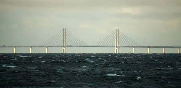 Bridge crossing Öresund, the sound between Sweden and Denmark in stormy waves seen from Lomma
