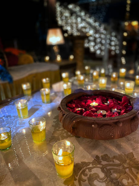 istock Floating oil lamp with rose petals 1267026800