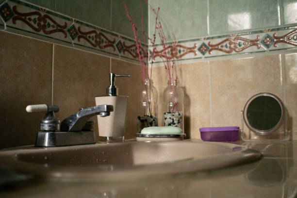 istock a sink faucets of a fully arranged home bathroom 1267031676
