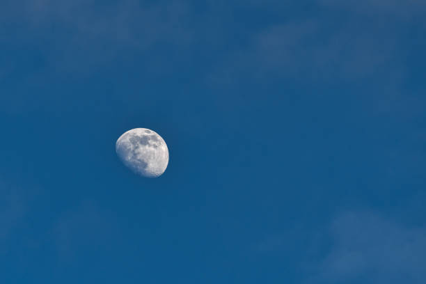 istock Observation of the moon against the sky, clearly visible artificial earth satellite. 1267031846