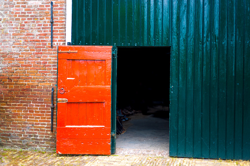 Dokkum, Friesland, Netherlands: Old Red Barn Door in Dokkum, one of the 11 Friesian historic cities.