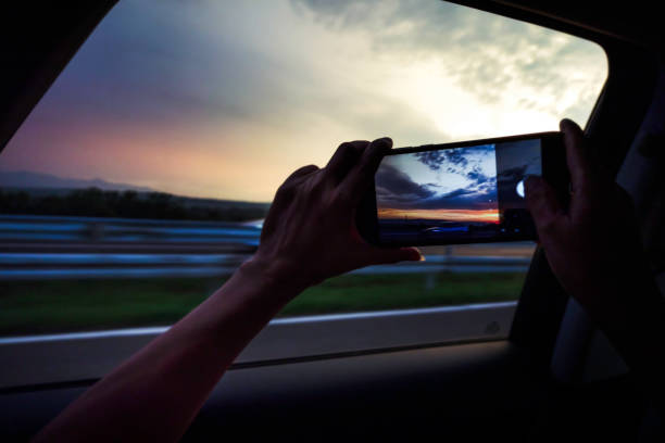 istock Taking photo on a road trip 1267034740
