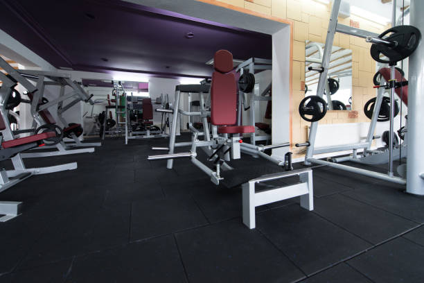 istock Large Modern Gym With Workout Equipment 1267040673