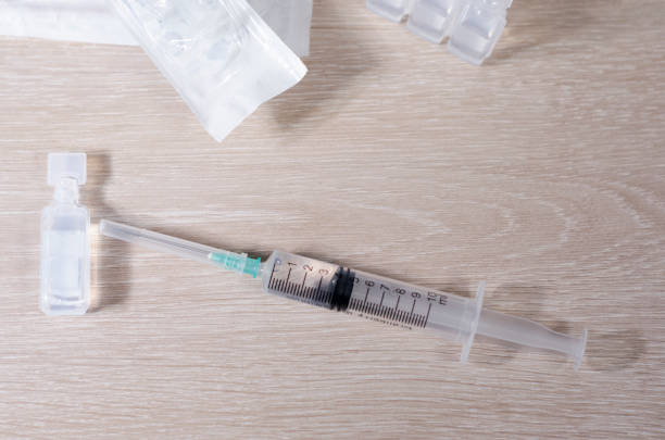 Injection of vaccines and syringes. It is used for the prevention, immunization and treatment of coronavirus infection, doctor uses syringe (new coronavirus disease 2019, COVID-19, Wuhan nCoV 2019). Infectious medicine concept. vacunas y jeringas. se utiliza para la prevención, inmunización y tratamiento de la infección por coronavirus, el médico utiliza jeringa (nueva enfermedad del coronavirus 2019, covid-19, wuhan ncov 2019). concepto de medicina infecciosa. último minuto