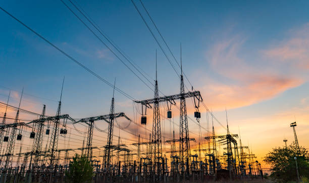 istock Electrical substation silhouette on the dramatic sunset background 1267047332