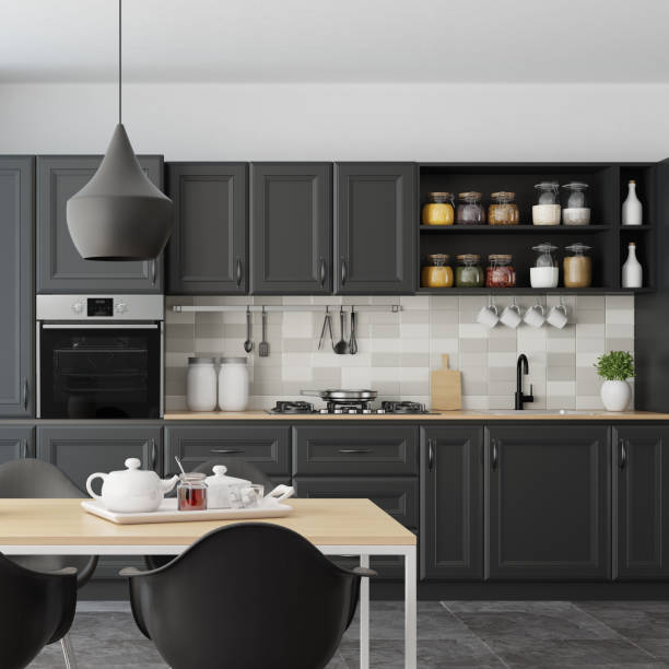 istock Modern Scandinavian kitchen and dining room with matte black traditional cabinet design 1267055992