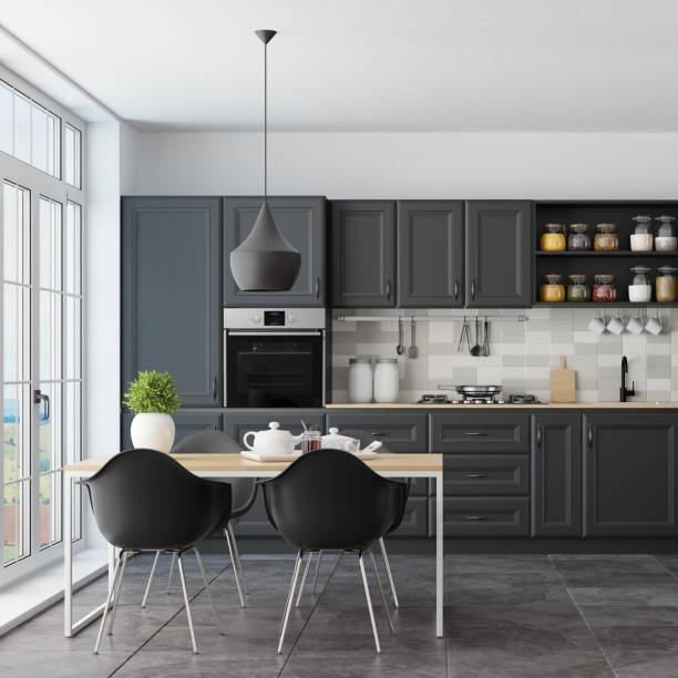 istock Modern Scandinavian kitchen and dining room with matte black traditional cabinet design 1267056531