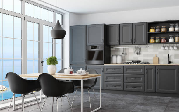 istock Modern Scandinavian kitchen and dining room with matte black traditional cabinet design 1267056532