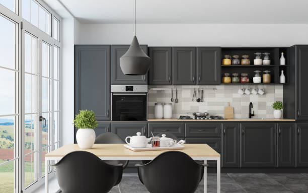 istock Modern Scandinavian kitchen and dining room with matte black traditional cabinet design 1267056678